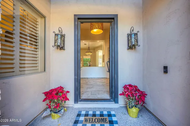 a view of a livingroom with furniture and windows