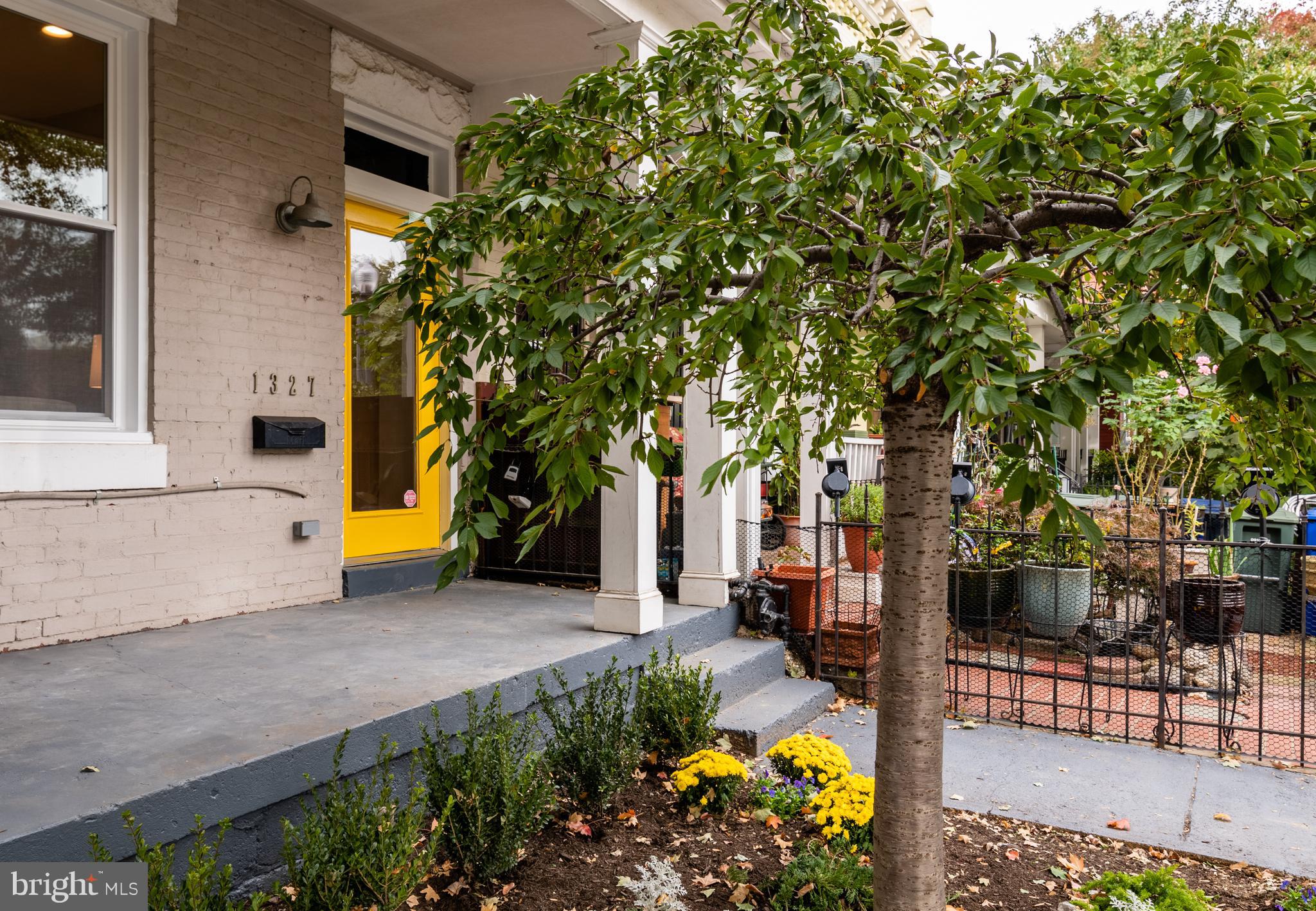 1327 V Street Northwest Washington, DC 20009 - Photo 2 of 29 a view of a street with large trees