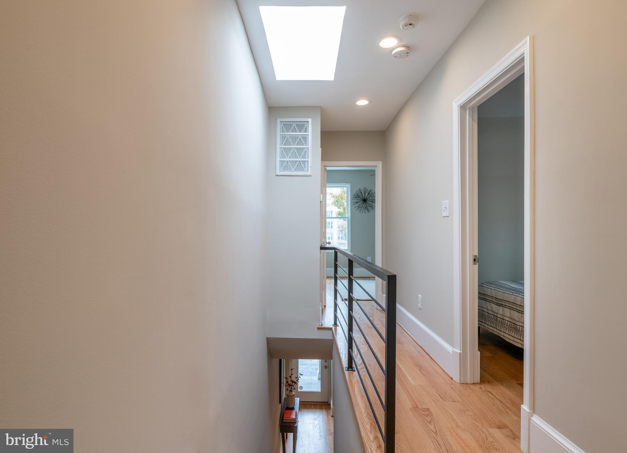 1327 V Street Northwest Washington, DC 20009 - Photo 20 of 29 a view of a hallway with wooden floor and entryway