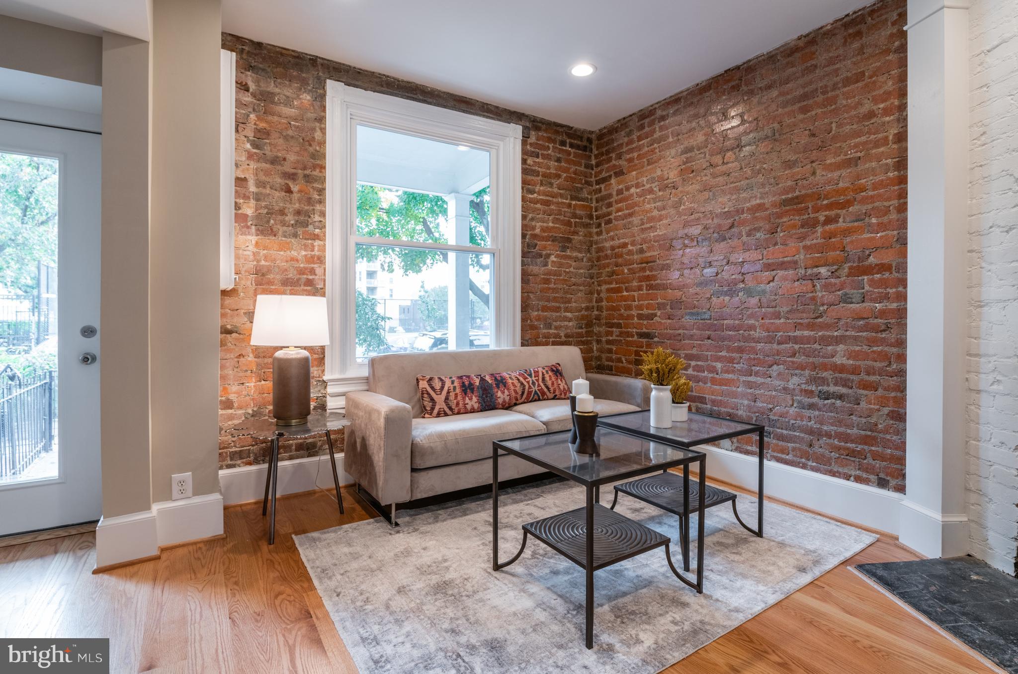 1327 V Street Northwest Washington, DC 20009 - Photo 5 of 29 a living room with furniture and a window
