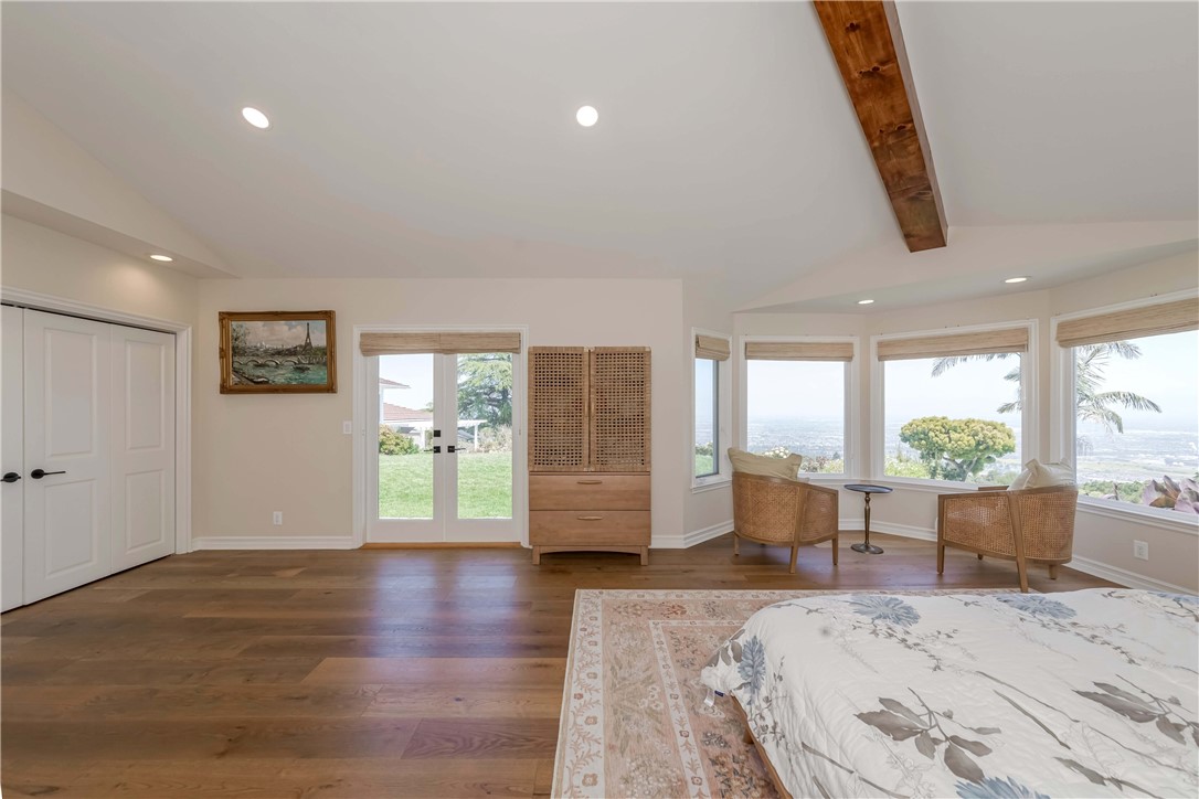1 Hackamore Road Rolling Hills, CA 90274 - Photo 39 of 57 a view of an empty room with wooden floor and a window