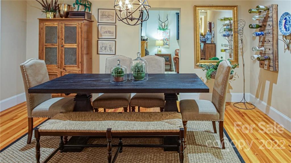123 Grace Heights Rutherfordton, NC 28139 - Photo 17 of 48 a view of a dining room with furniture and wooden floor
