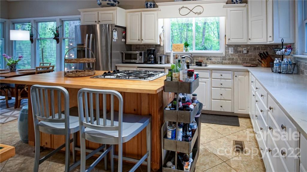 123 Grace Heights Rutherfordton, NC 28139 - Photo 18 of 48 a kitchen with a sink stove and cabinets