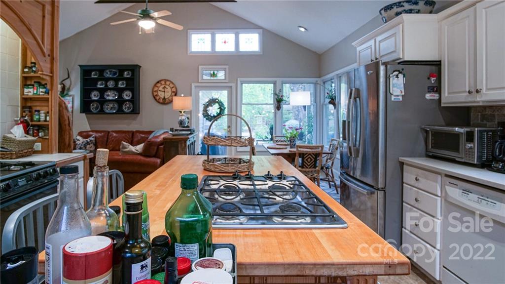123 Grace Heights Rutherfordton, NC 28139 - Photo 19 of 48 a kitchen with furniture a refrigerator a stove and a sink
