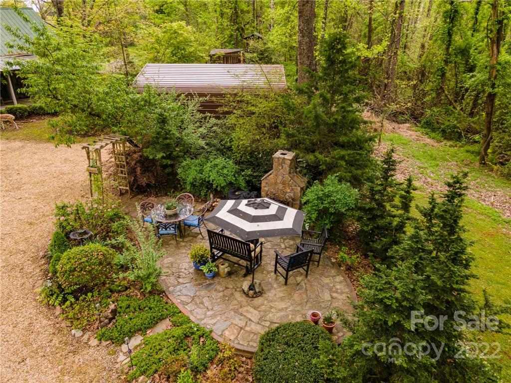 123 Grace Heights Rutherfordton, NC 28139 - Photo 6 of 48 a backyard of a house with table and chairs