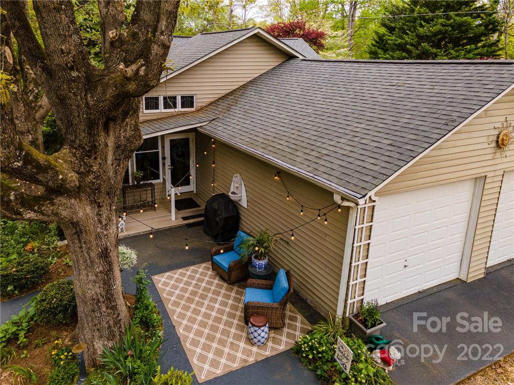 123 Grace Heights Rutherfordton, NC 28139 - Photo 8 of 48 a view of a patio with table and chairs and potted plants