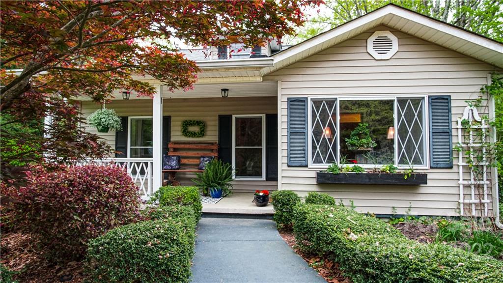 123 Grace Heights Rutherfordton, NC 28139 - Photo 10 of 48 front view of a house with potted plants