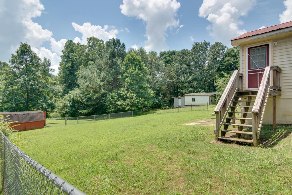 7810 Chester Road Fairview, TN 37062 - Photo 16 of 17 a view of a backyard with swimming pool