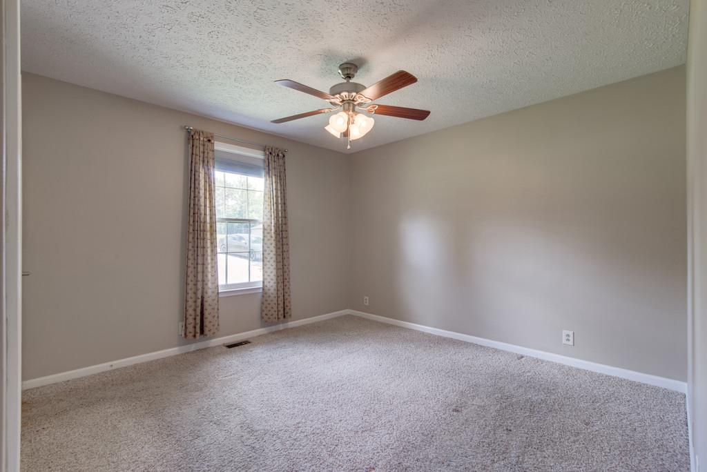 7810 Chester Road Fairview, TN 37062 - Photo 10 of 17 a view of an empty room with a window