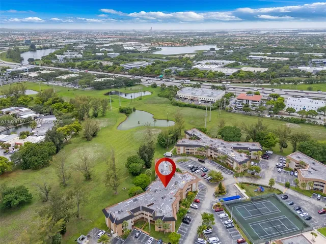 an aerial view of residential house with outdoor space