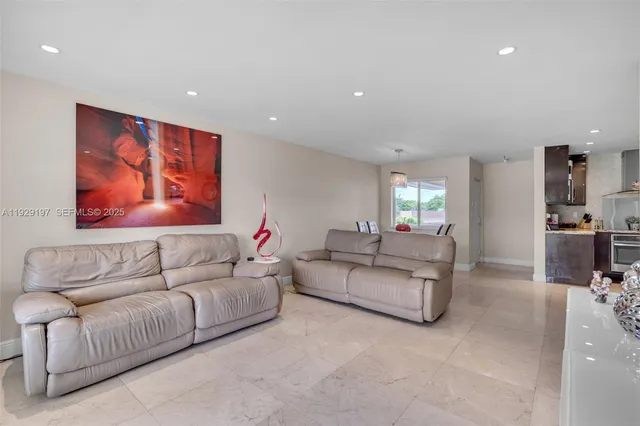 a living room with furniture and a couch