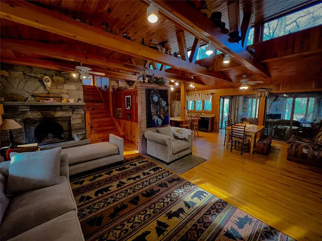 a bedroom with a bed and a mirror