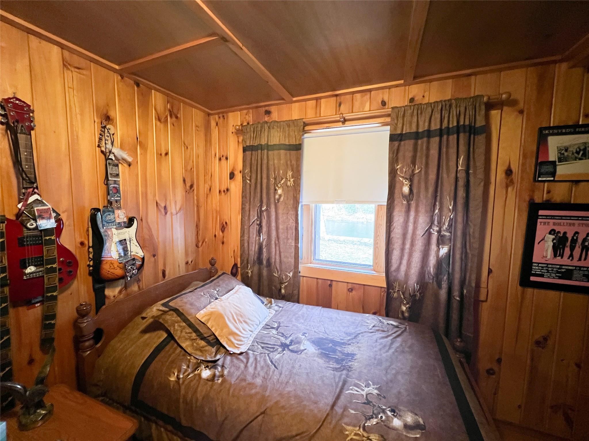 46 Beaverkill Mountain Road Roscoe, NY 12776 - Photo 20 of 27 a bedroom with a bed and a window
