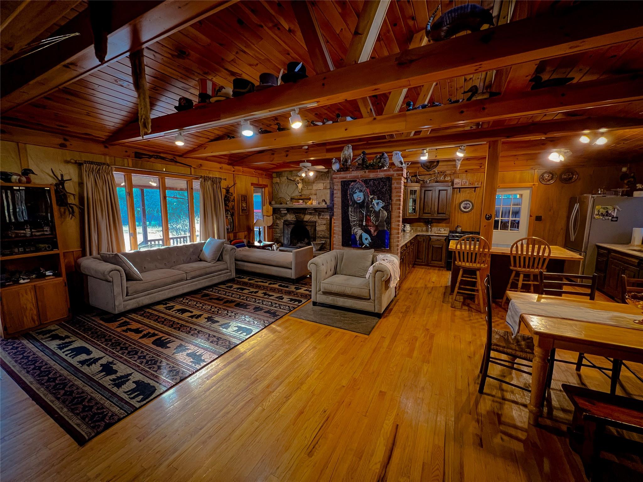 46 Beaverkill Mountain Road Roscoe, NY 12776 - Photo 21 of 27 a living room with furniture lots of wooden furniture