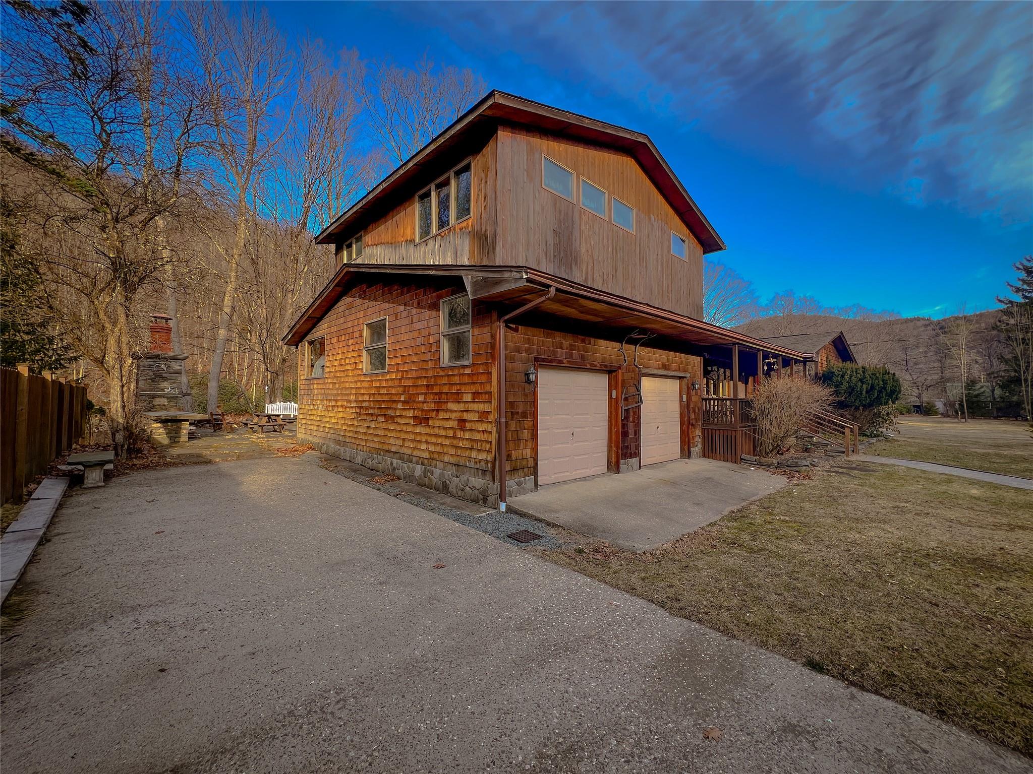 46 Beaverkill Mountain Road Roscoe, NY 12776 - Photo 4 of 27 a view of a house with a street