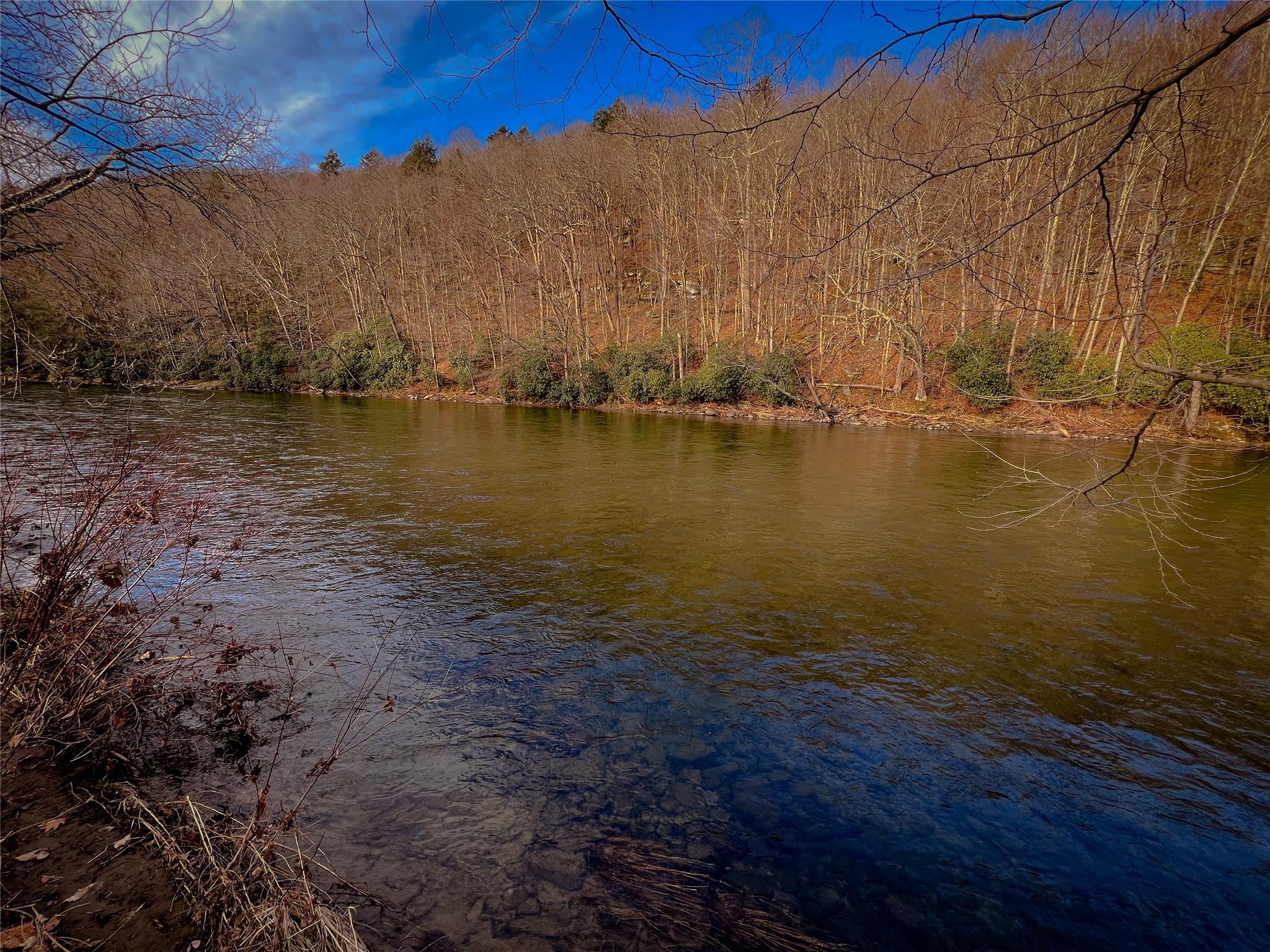 46 Beaverkill Mountain Road Roscoe, NY 12776 - Photo 7 of 27 a view of an ocean with a mountain