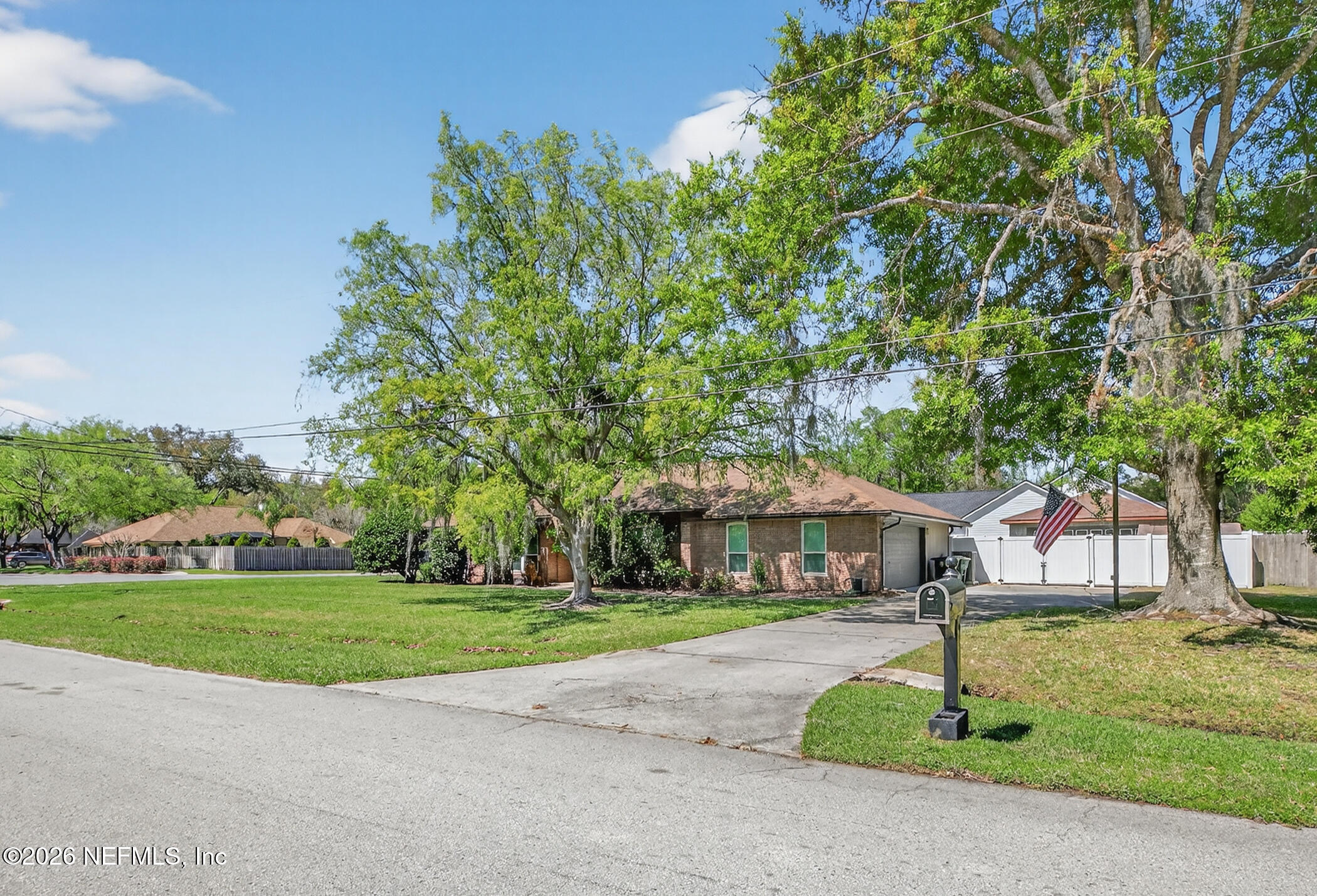 12227 Flynn Woods Road Jacksonville, FL 32223 - Photo 2 of 62 Mature Landscaping