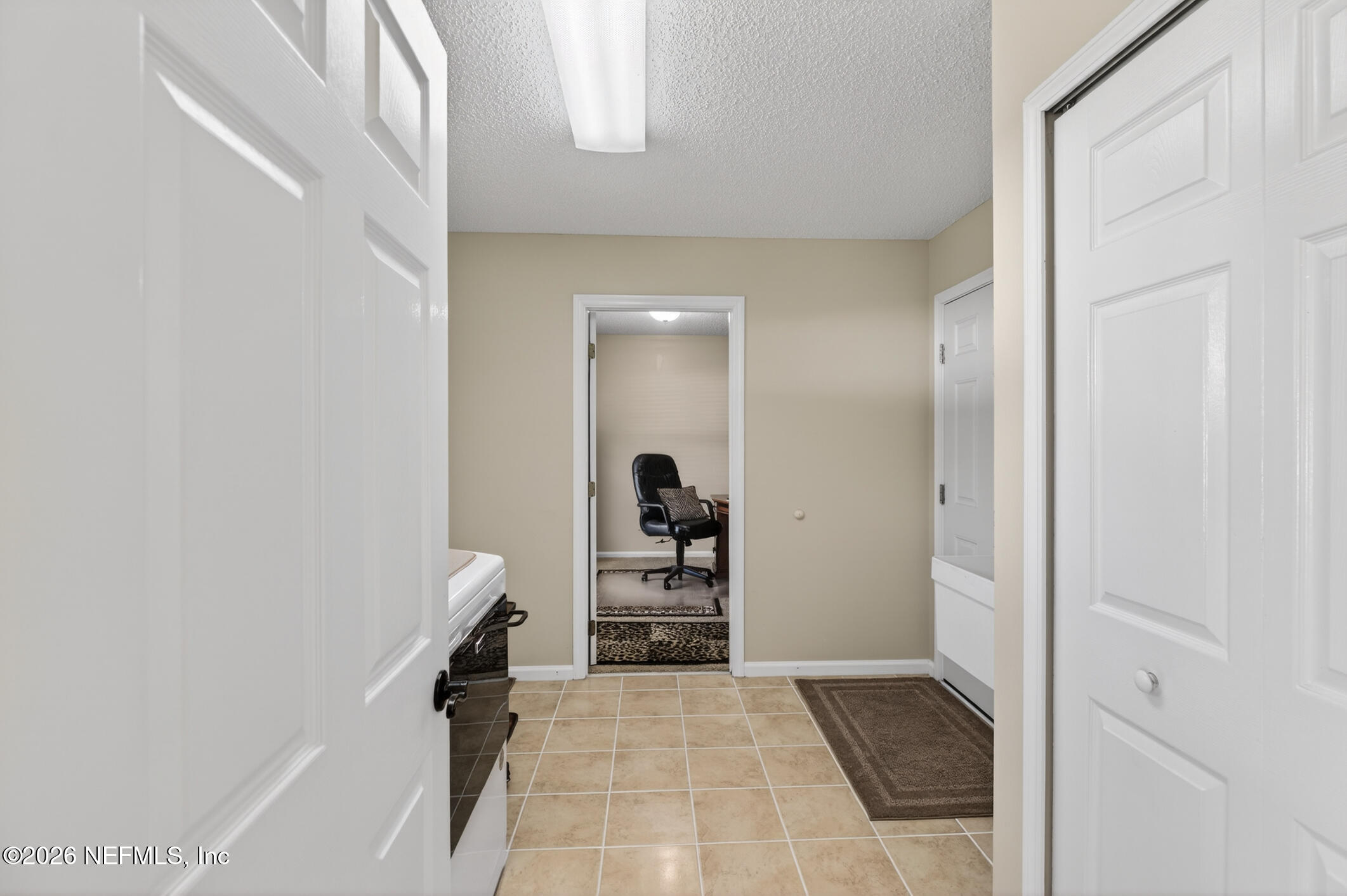 12227 Flynn Woods Road Jacksonville, FL 32223 - Photo 45 of 62 Spacious Laundry Area