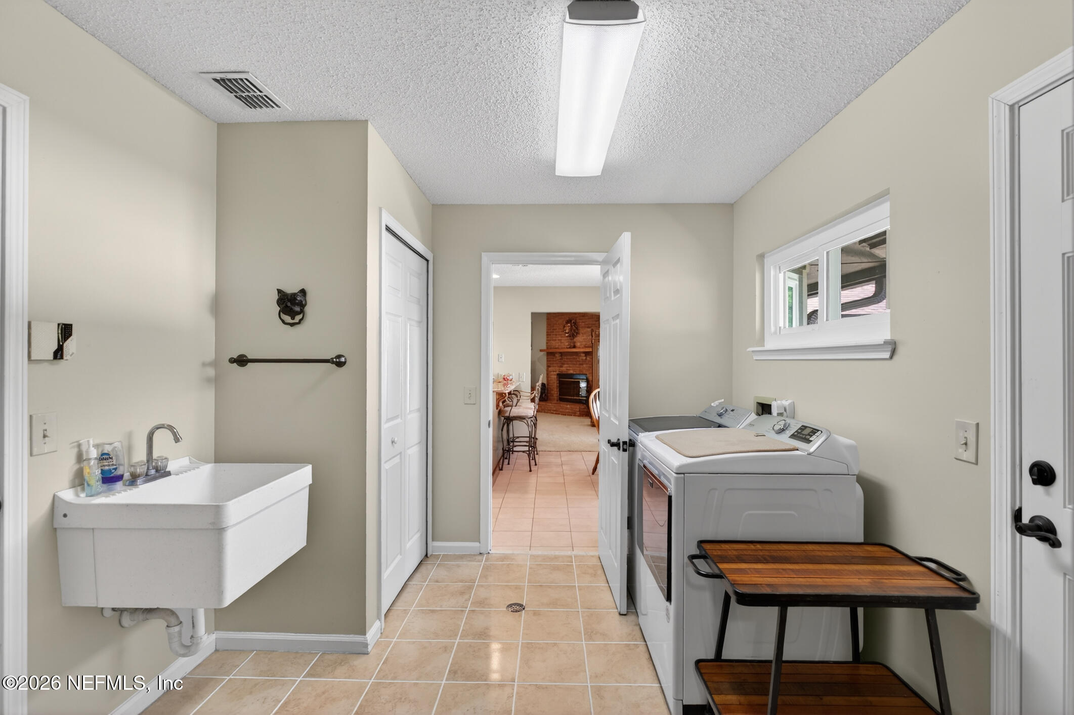 12227 Flynn Woods Road Jacksonville, FL 32223 - Photo 47 of 62 Dedicated Laundry Room