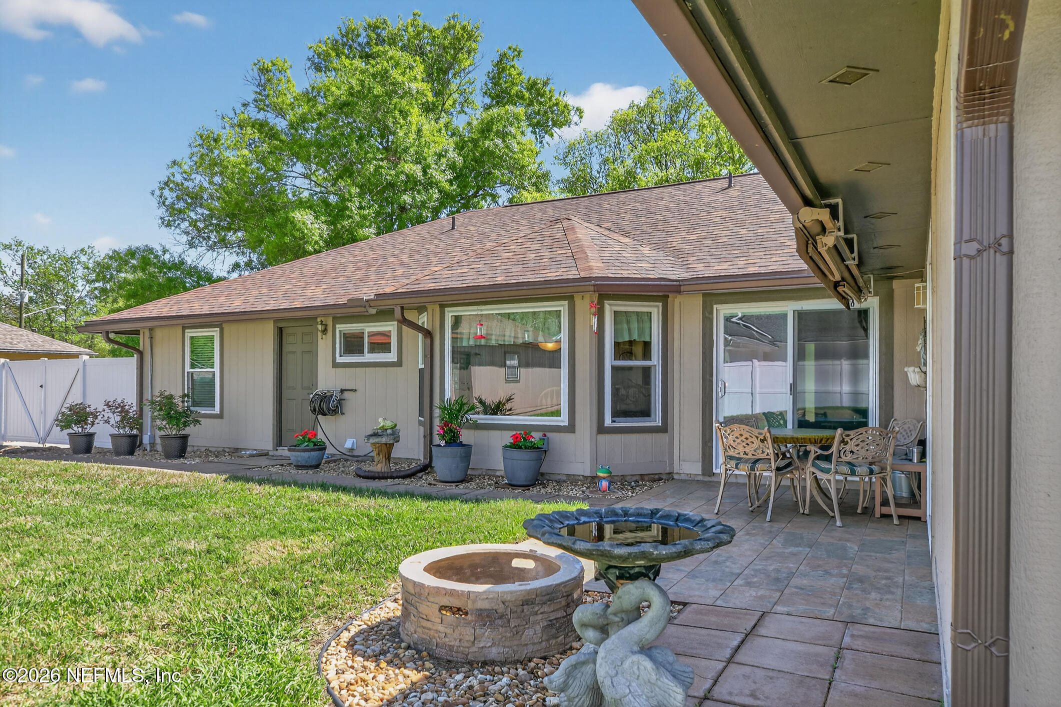 12227 Flynn Woods Road Jacksonville, FL 32223 - Photo 56 of 62 Backyard Firepit Area