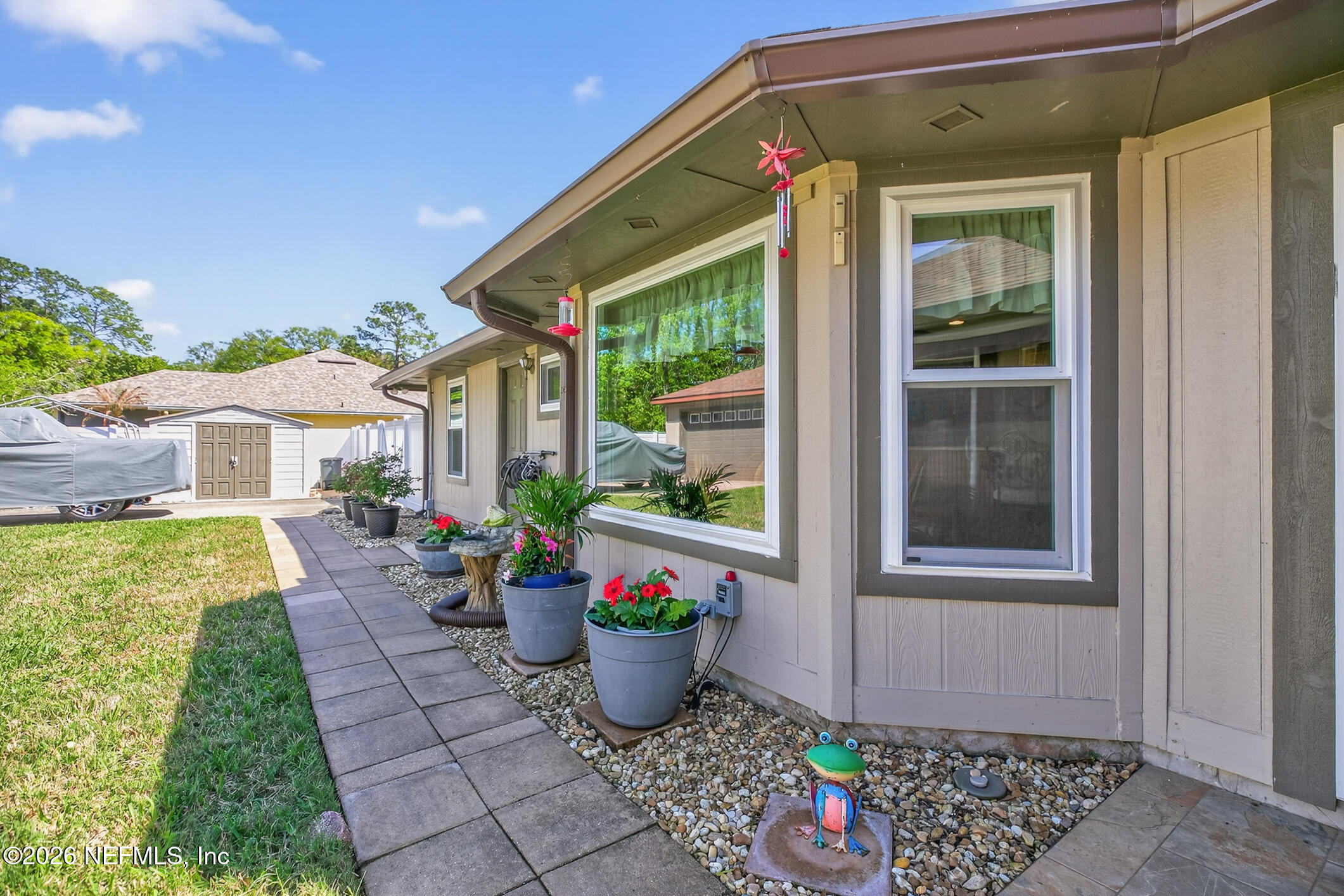 12227 Flynn Woods Road Jacksonville, FL 32223 - Photo 58 of 62 Charming Pathway Entry