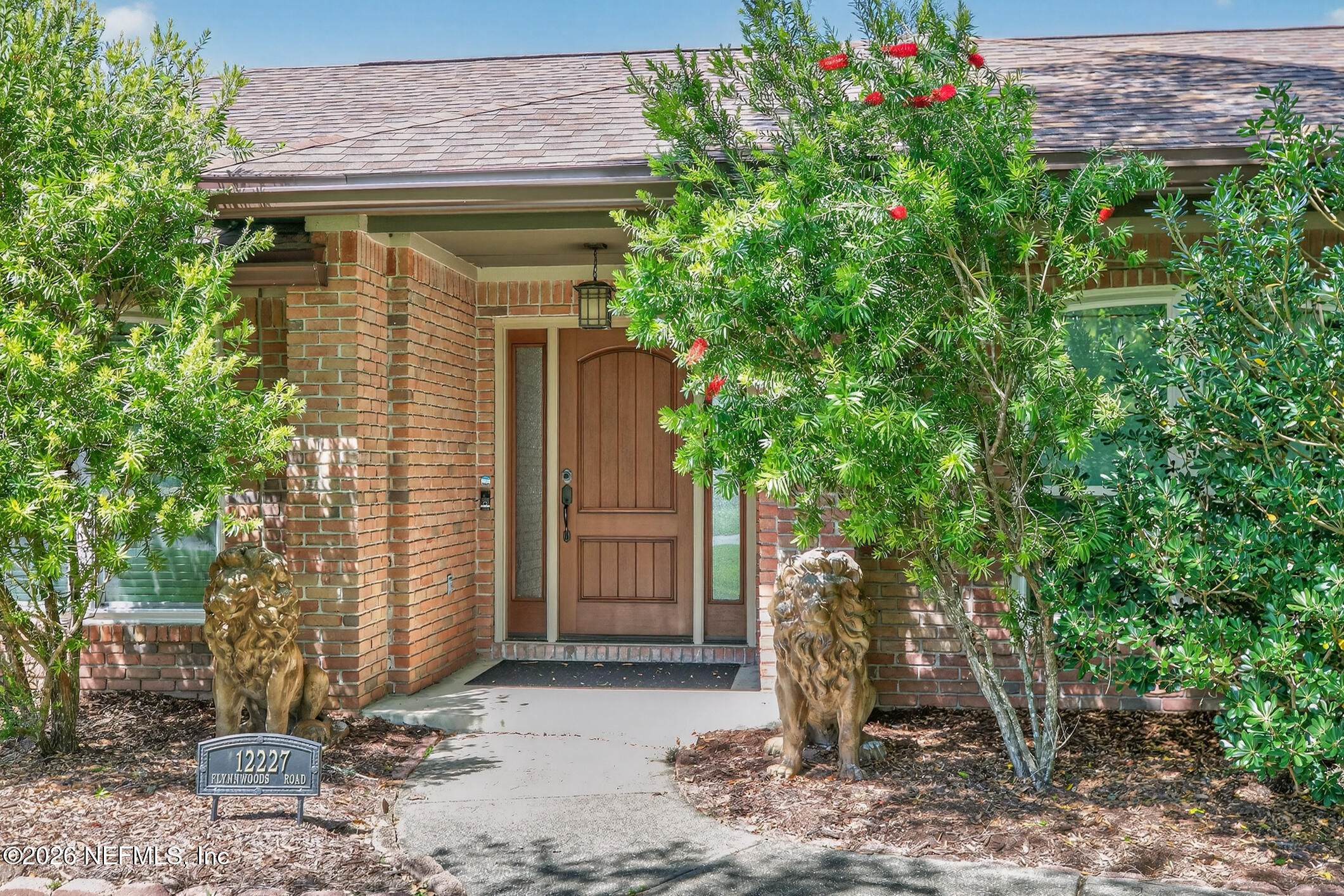 12227 Flynn Woods Road Jacksonville, FL 32223 - Photo 7 of 62 Covered Entryway