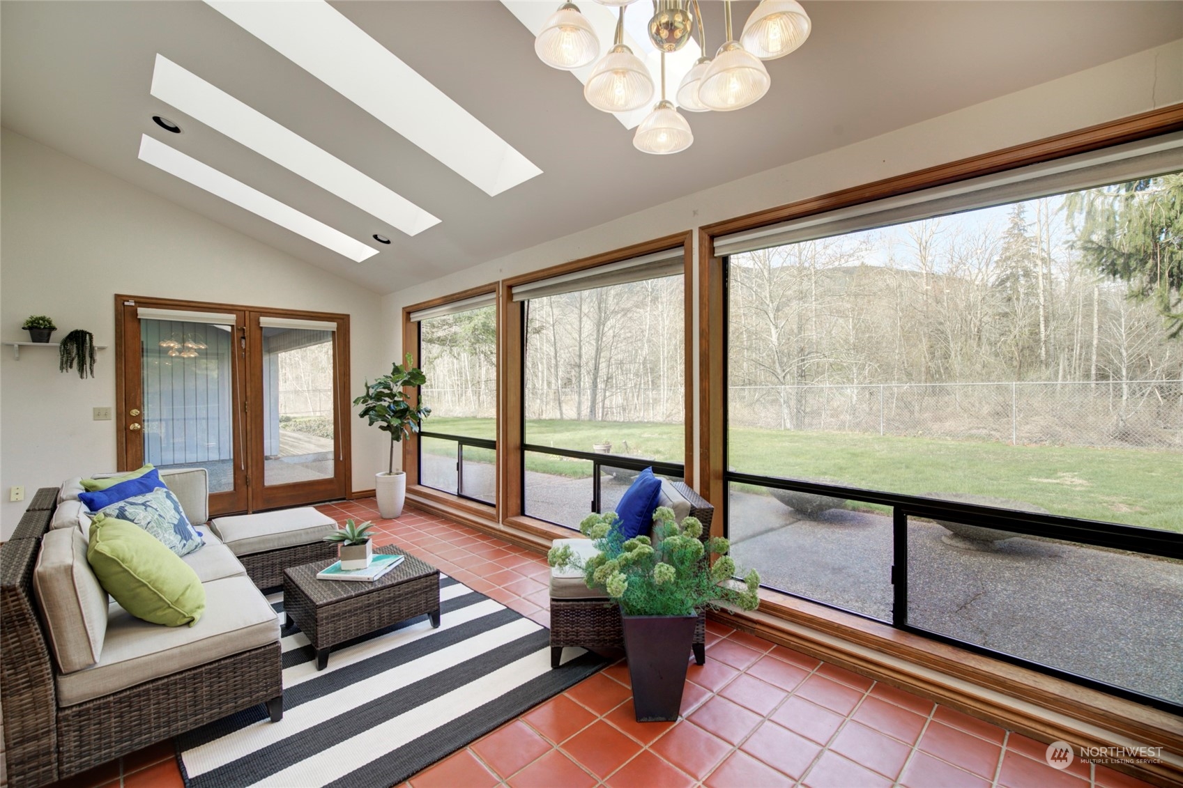 925 Riverside Drive Southeast North Bend, WA 98045 - Photo 12 of 30 a living room with furniture and a large window