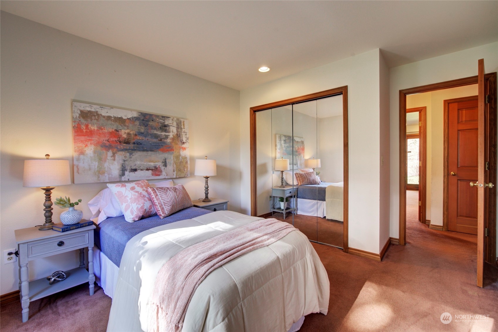 925 Riverside Drive Southeast North Bend, WA 98045 - Photo 20 of 30 a bedroom with a bed and large window