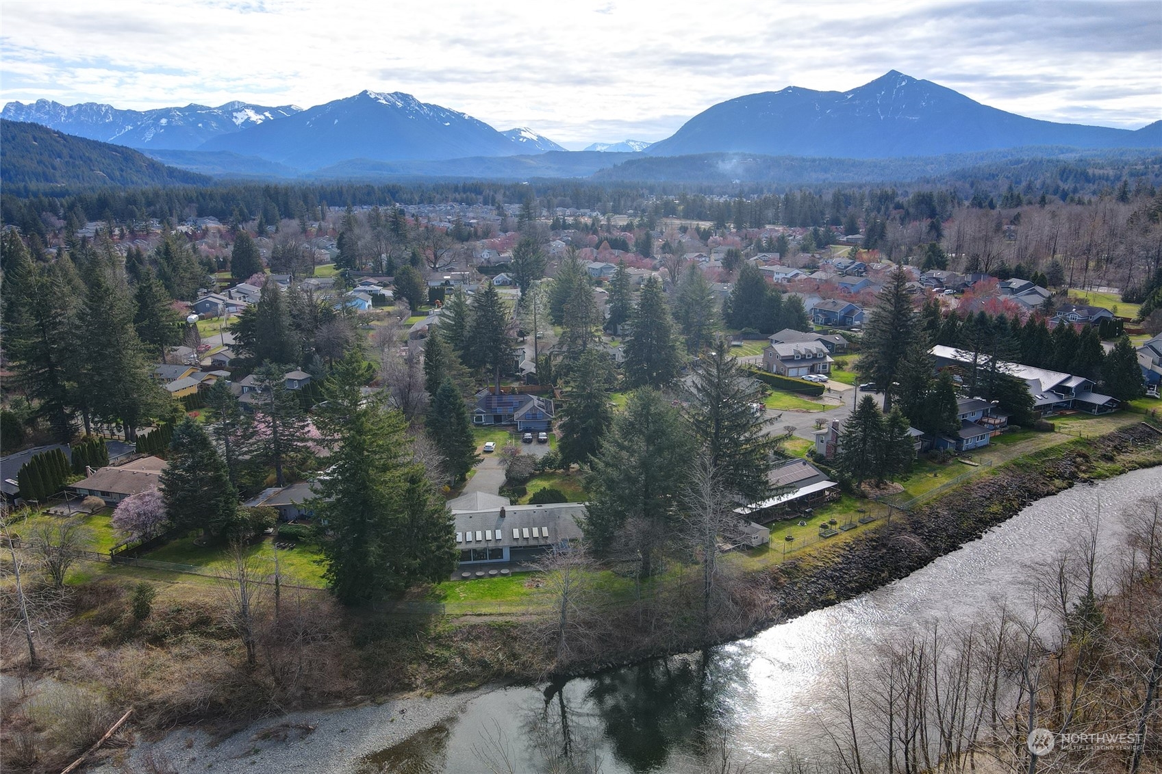 925 Riverside Drive Southeast North Bend, WA 98045 - Photo 2 of 30 an aerial view of residential house and tree
