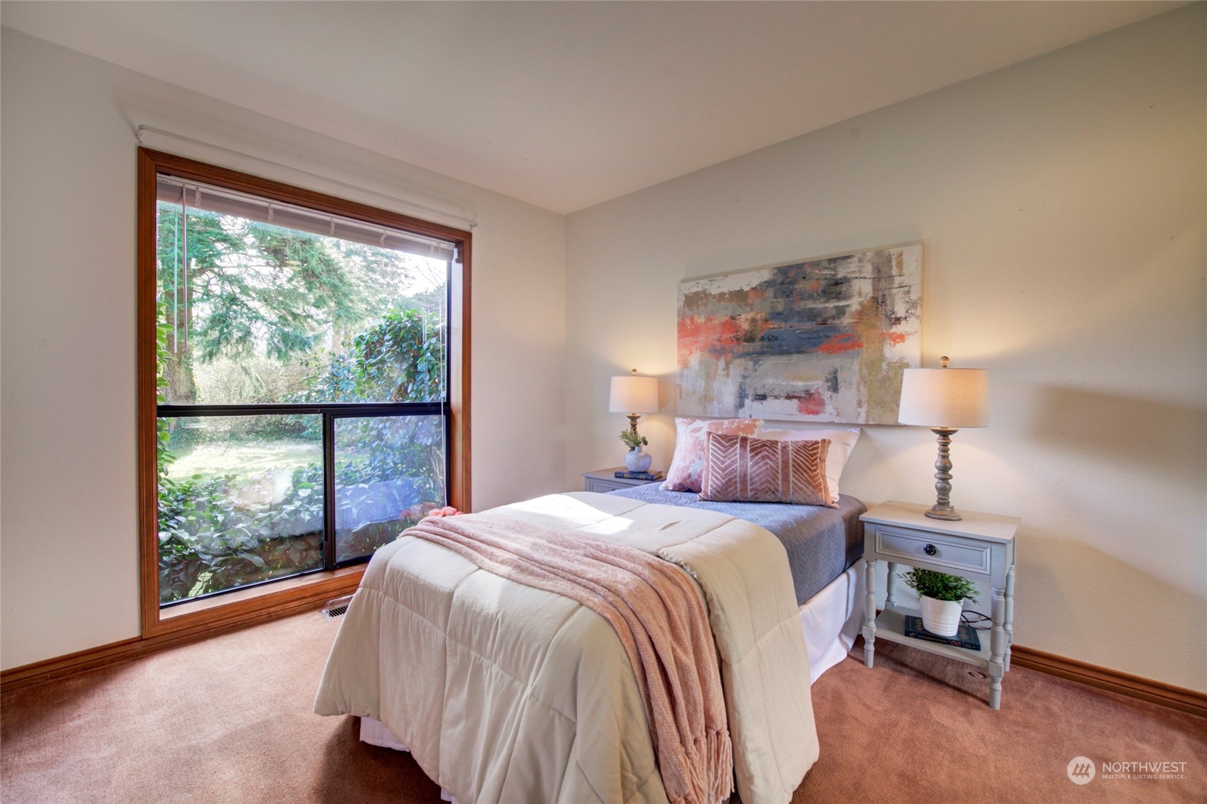 925 Riverside Drive Southeast North Bend, WA 98045 - Photo 21 of 30 a bedroom with a bed and a window