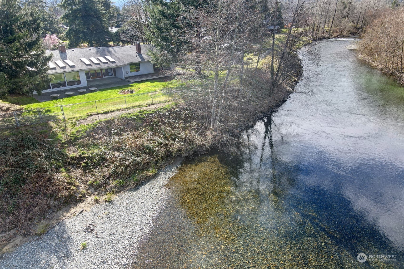 925 Riverside Drive Southeast North Bend, WA 98045 - Photo 3 of 30 a view of a yard with swimming pool