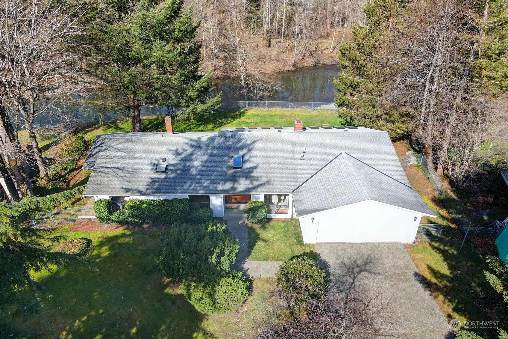 925 Riverside Drive Southeast North Bend, WA 98045 - Photo 4 of 30 an aerial view of a house with a yard