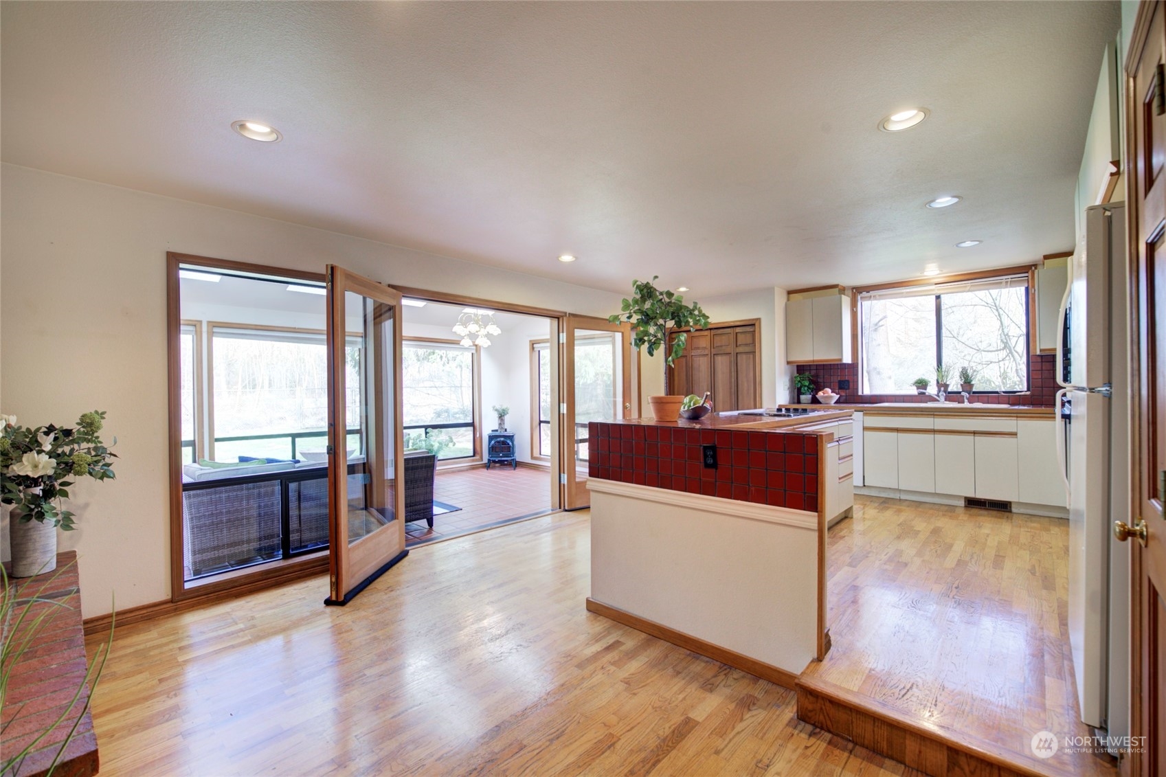 925 Riverside Drive Southeast North Bend, WA 98045 - Photo 9 of 30 a living room with furniture and large windows