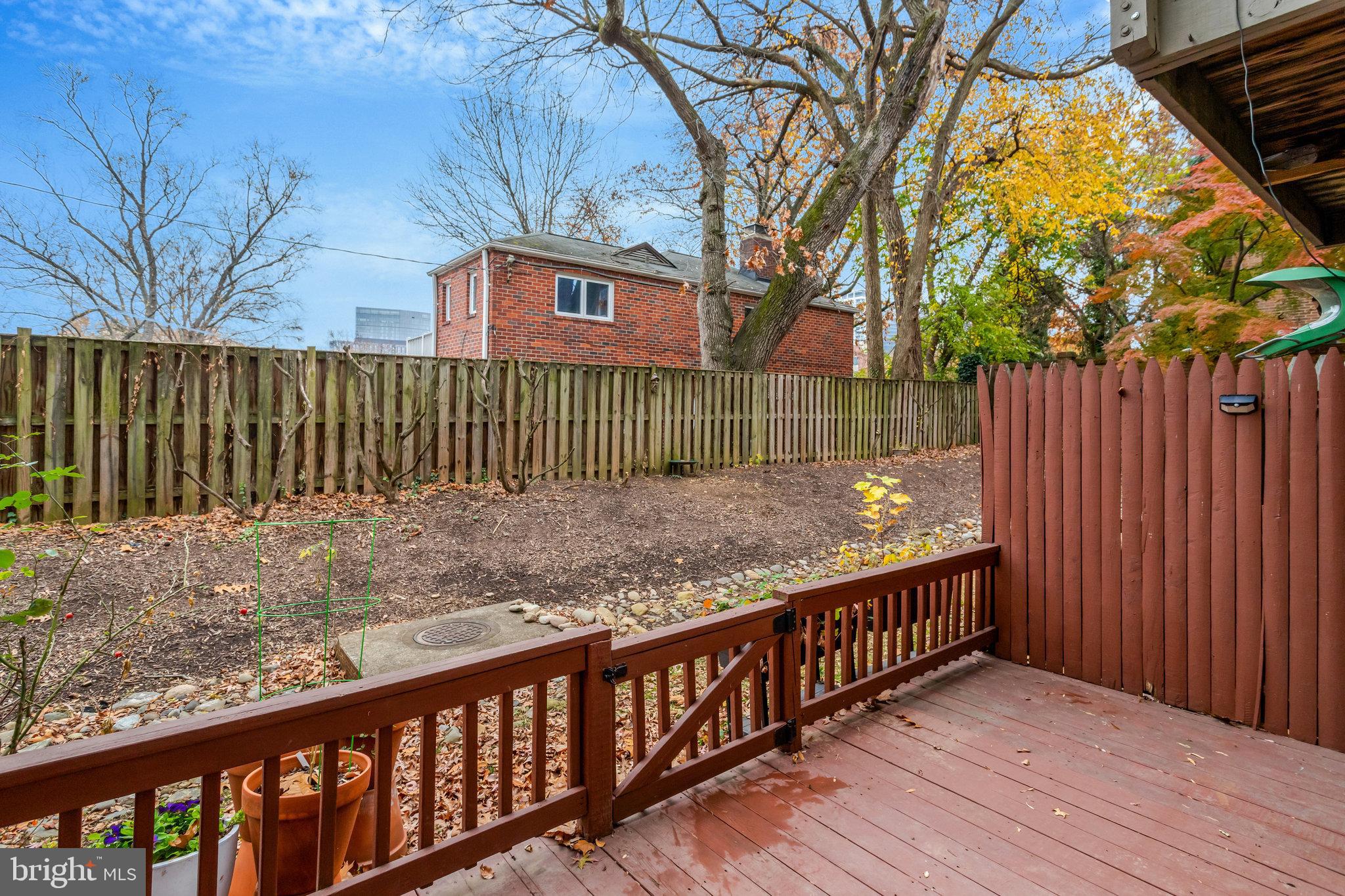 2101 North Rolfe Street, Unit C Arlington, VA 22209 - Photo 26 of 26 a view of a wooden fence