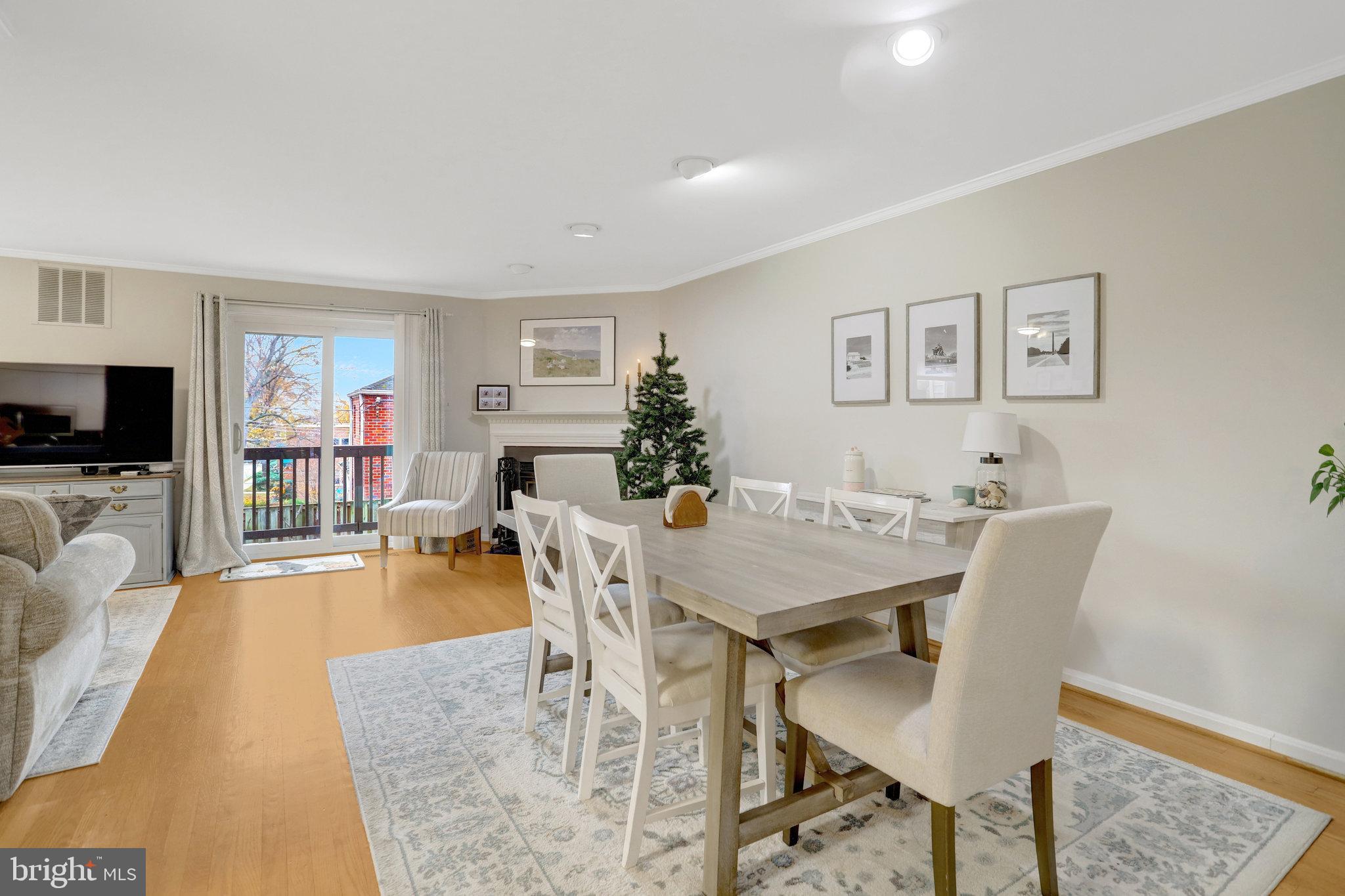2101 North Rolfe Street, Unit C Arlington, VA 22209 - Photo 3 of 26 a view of a dining room with furniture