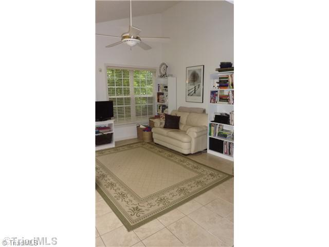 109 Culler Way King, NC 27021 - Photo 6 of 16 Sunroom. Nice size sunroom has vaulted ceiling, ceiling fan with light kit and tile floor.