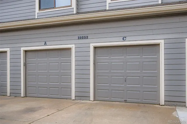 a view of a house with a tree