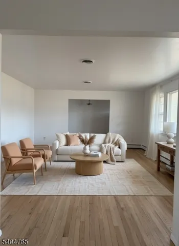 a living room with furniture and a couch