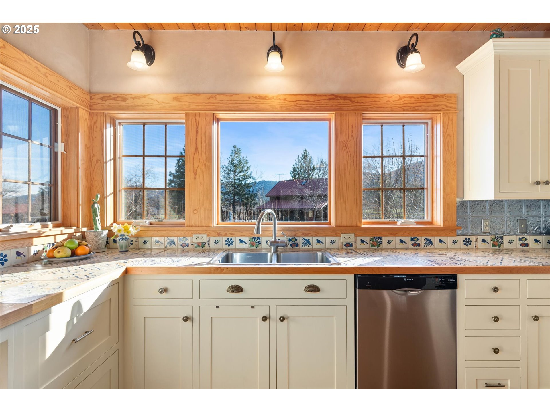 48303 Cornucopia Highway Halfway, OR 97834 - Photo 19 of 48 a kitchen with a sink and large window