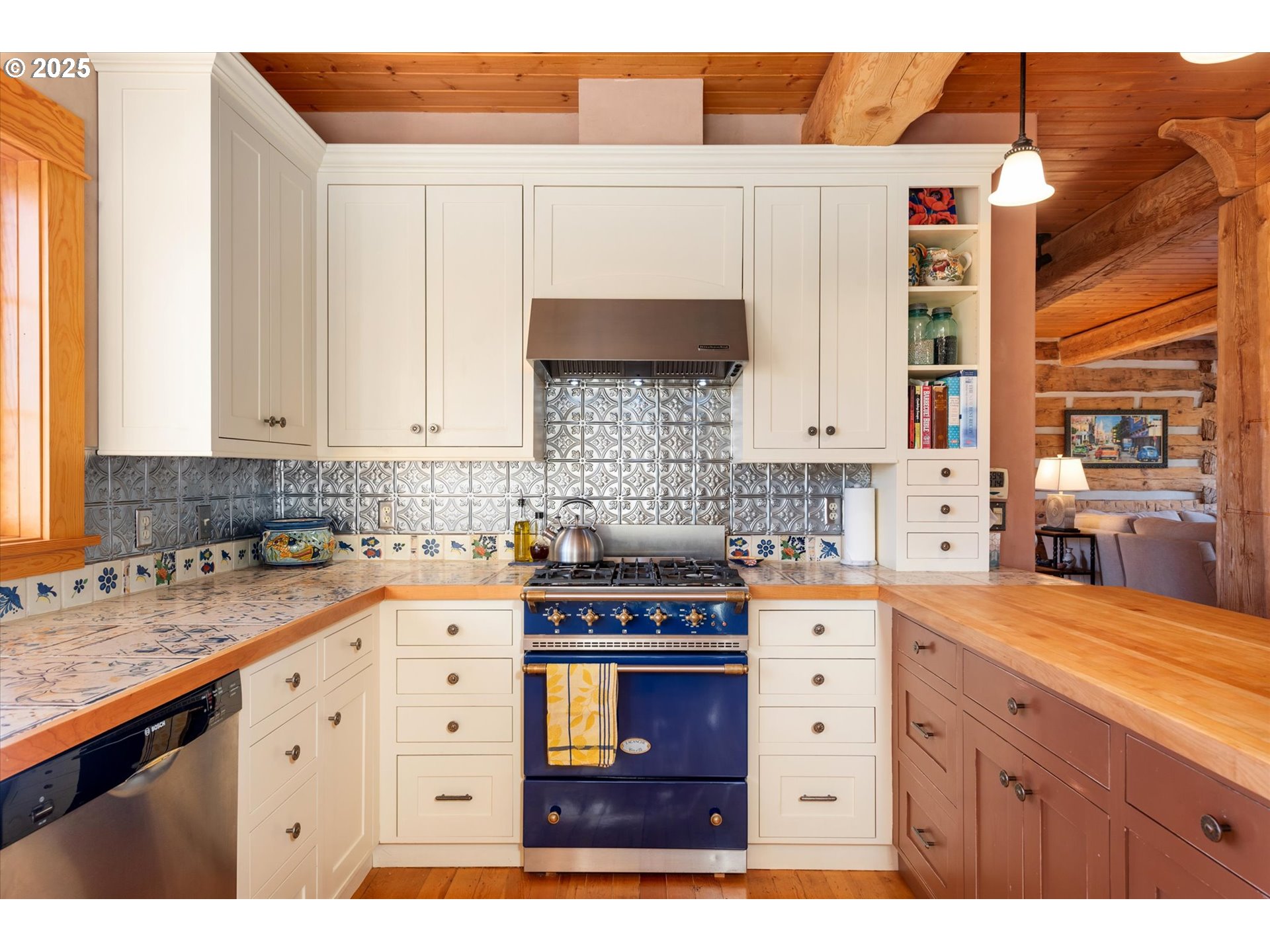 48303 Cornucopia Highway Halfway, OR 97834 - Photo 20 of 48 a kitchen with stainless steel appliances granite countertop a stove a sink and a microwave