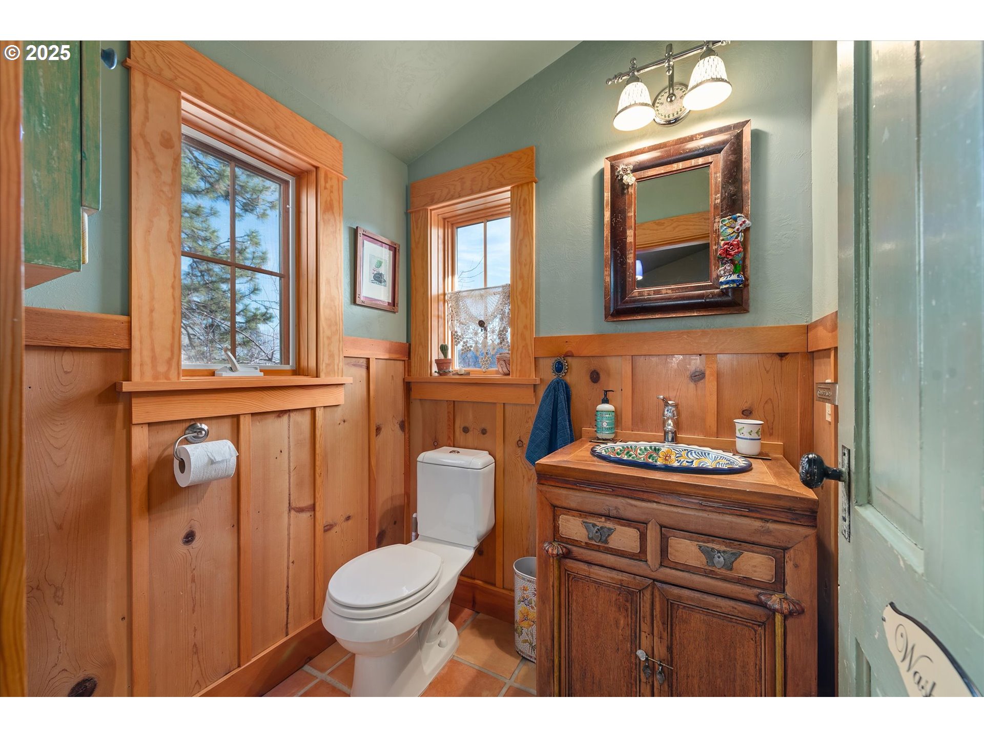 48303 Cornucopia Highway Halfway, OR 97834 - Photo 24 of 48 a bathroom with a toilet a sink and a mirror