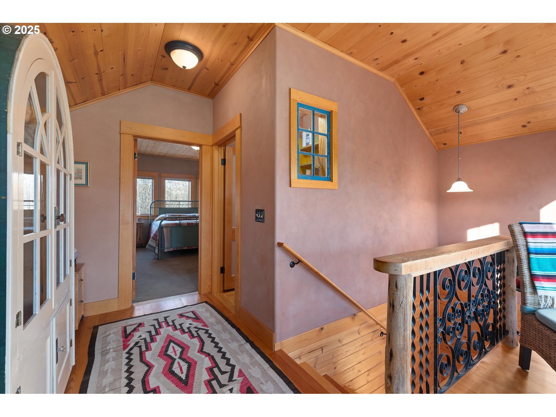 48303 Cornucopia Highway Halfway, OR 97834 - Photo 30 of 48 a view of hallway with stairs and wooden floor