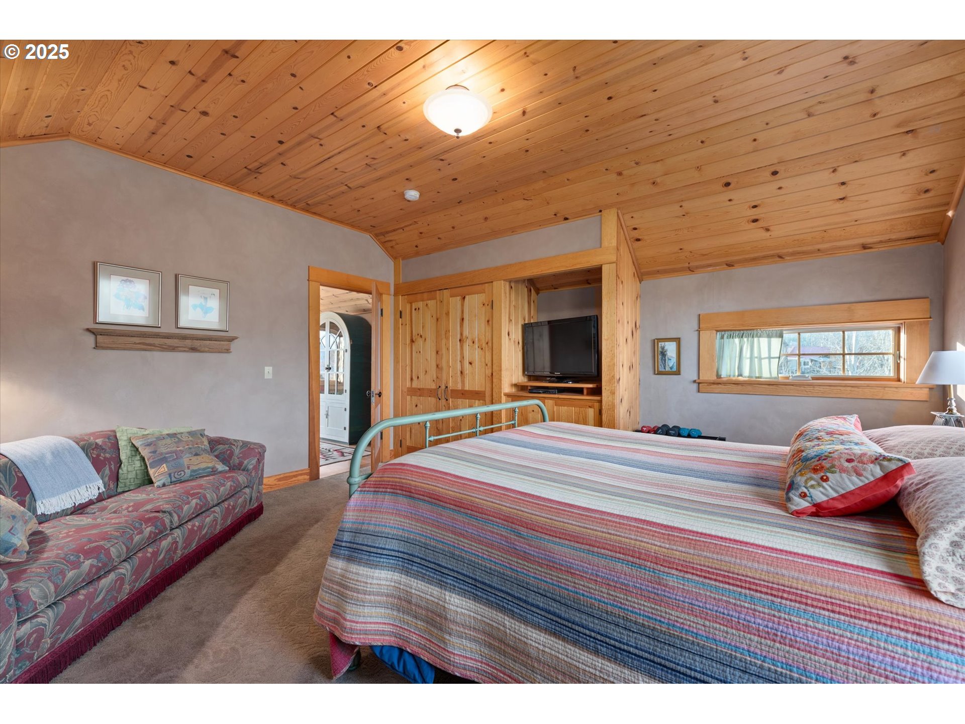 48303 Cornucopia Highway Halfway, OR 97834 - Photo 34 of 48 a bedroom with a bed and wooden floor