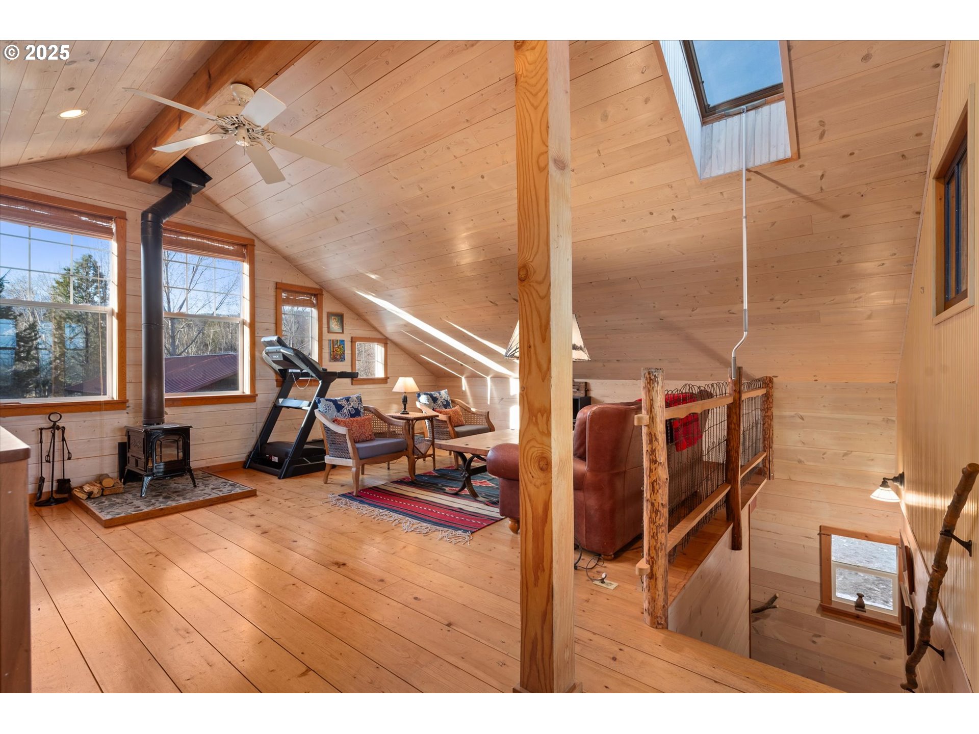 48303 Cornucopia Highway Halfway, OR 97834 - Photo 36 of 48 a room with gym equipment and a large window