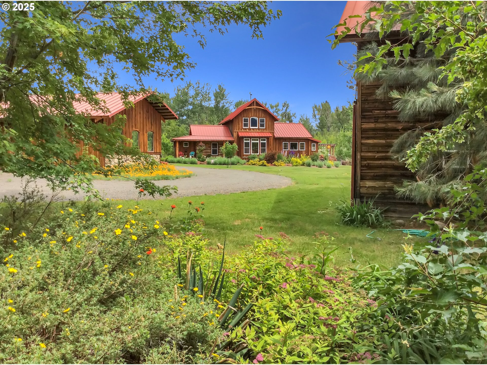 48303 Cornucopia Highway Halfway, OR 97834 - Photo 4 of 48 a view of a house with a big yard