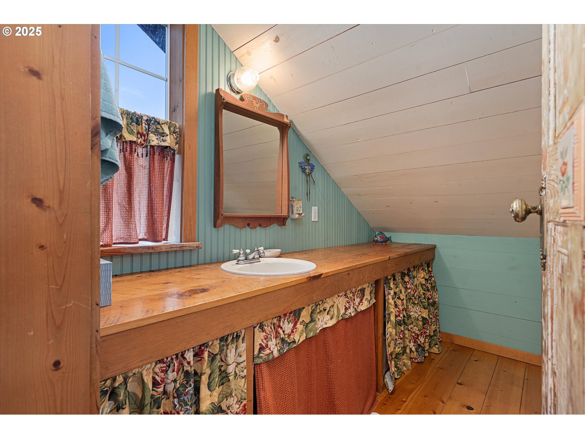 48303 Cornucopia Highway Halfway, OR 97834 - Photo 41 of 48 a bathroom with a sink and a mirror