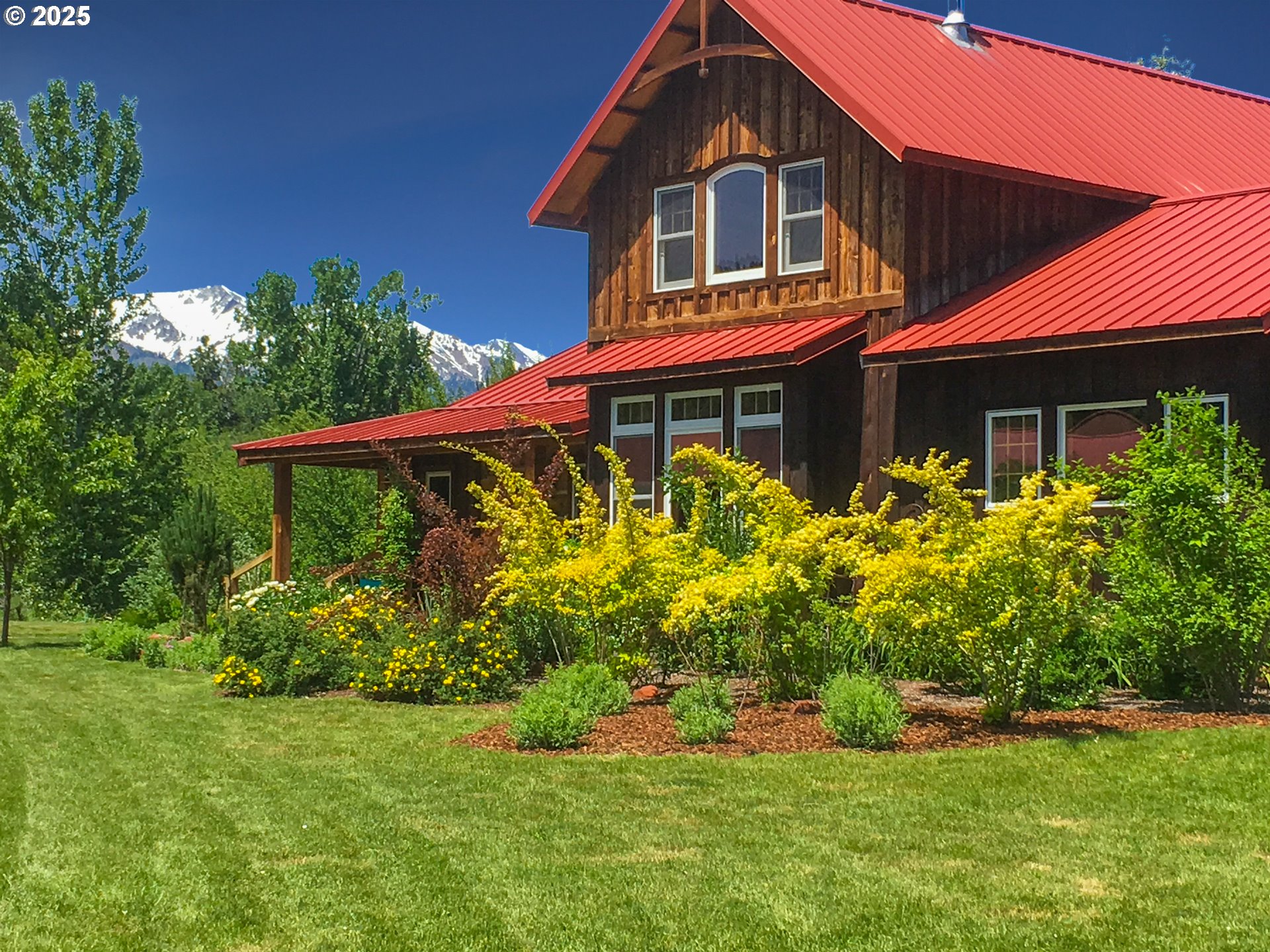 48303 Cornucopia Highway Halfway, OR 97834 - Photo 48 of 48 a front view of a house with a yard