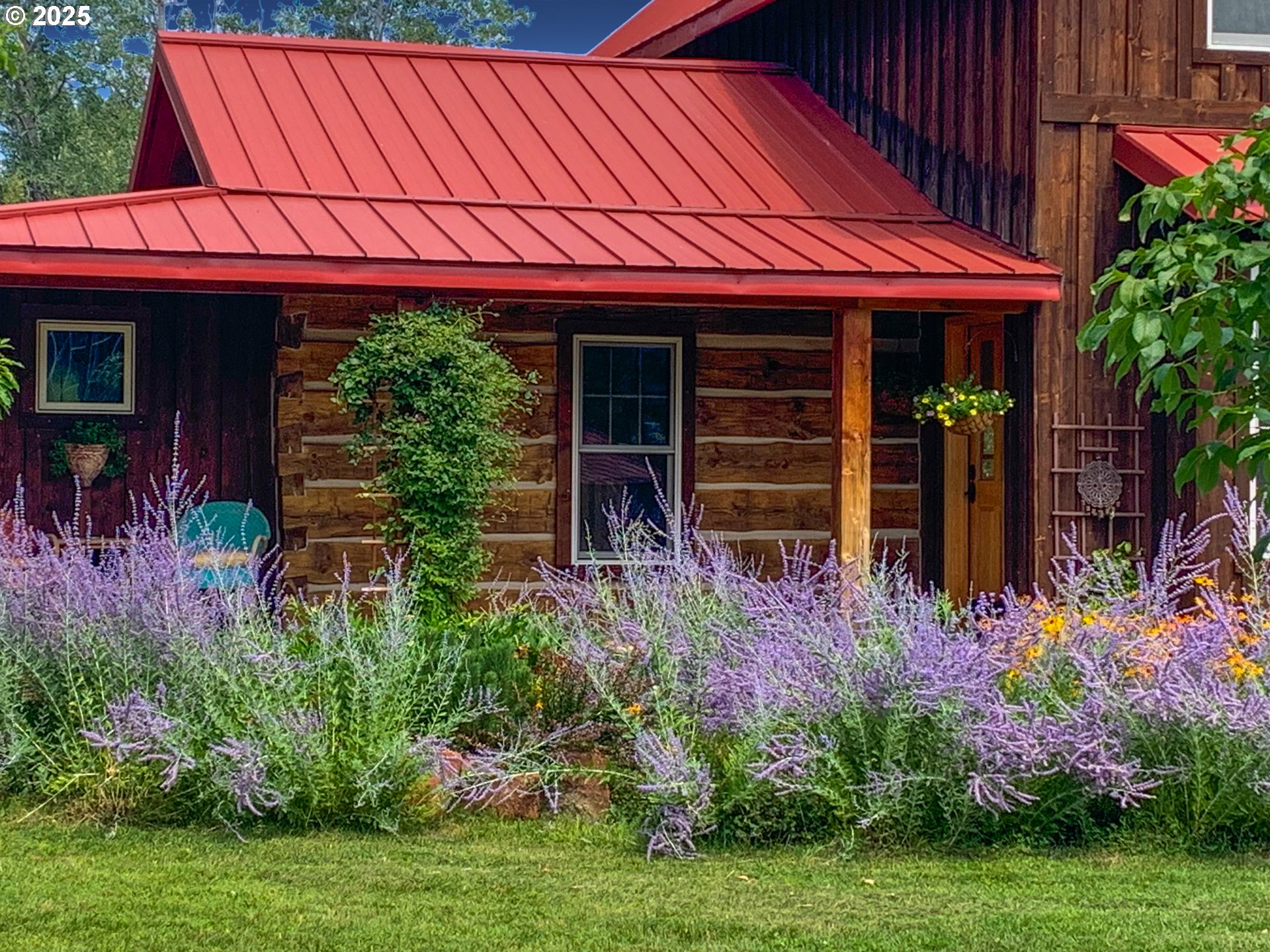 48303 Cornucopia Highway Halfway, OR 97834 - Photo 7 of 48 a front view of a house with a garden