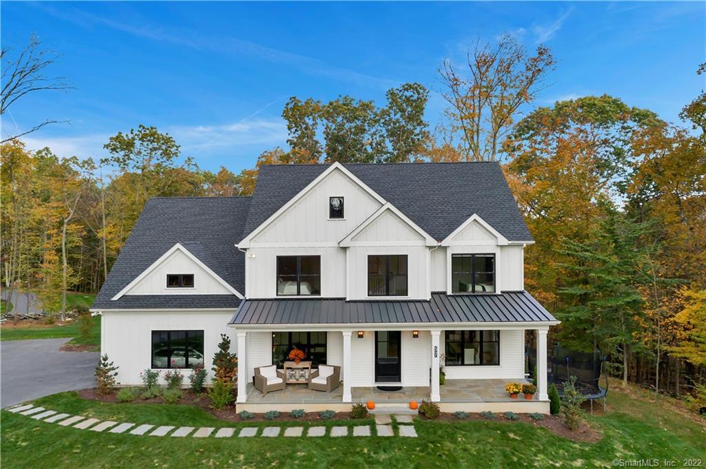 57 Robin Hill Road Newtown, CT 06470 - Photo 1 of 1 a view of house with garden