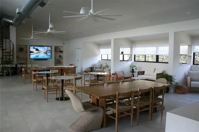 a view of a dining room with furniture